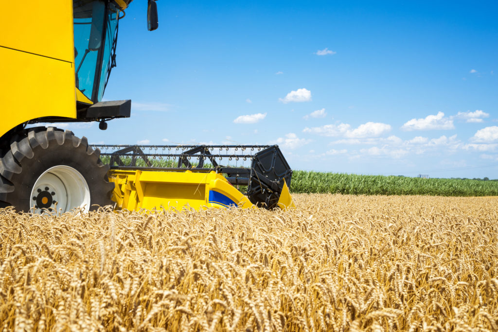 Combine harvester working in the field.