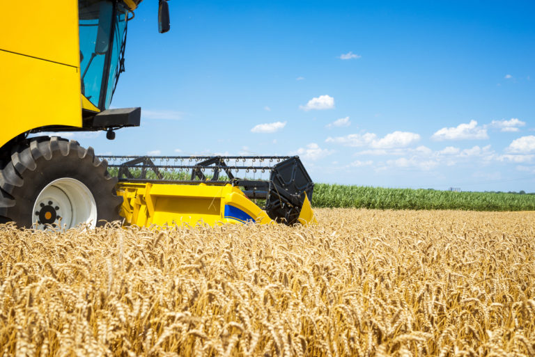 Combine harvester working in the field.