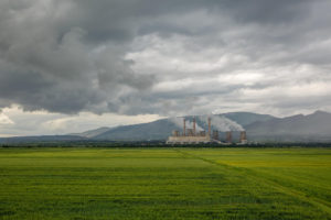 factory-green-field-cloudy