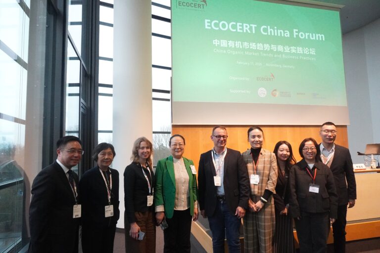 Ecocert China Forum speakers pose following productive exchange