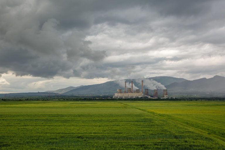 factory-green-field-cloudy